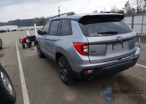 2019 Honda Passport Touring z USA, uszkodzony, nr VIN 5FNYF7H95KB004174